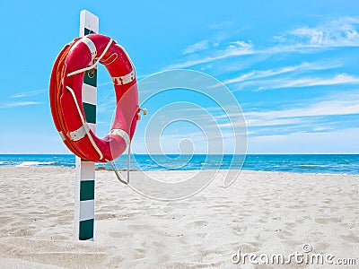 Lifesaver on beach Stock Photo