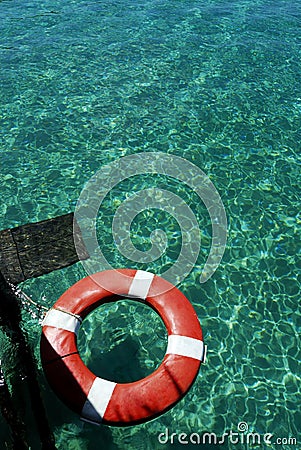 Lifesaver on green water surface Stock Photo