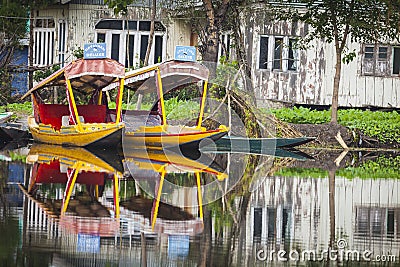 Lifestyle in Dal lake, local people use `Shikara`, a small boat Editorial Stock Photo