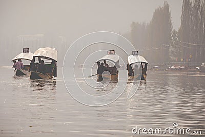 Lifestyle in Dal lake, local people use `Shikara`, a small boat Editorial Stock Photo