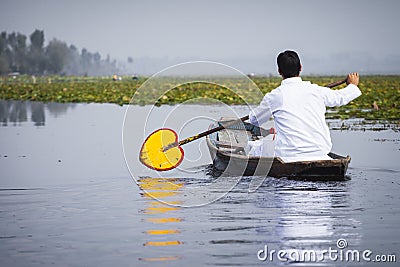 Lifestyle in Dal lake, local people use `Shikara`, a small boat Editorial Stock Photo