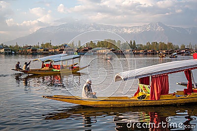 Lifestyle in Dal lake with Shikara boat, Srinagar, India Editorial Stock Photo