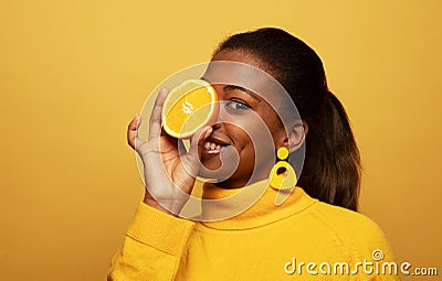 lifestyle, food, diet and people concept: Optimist Young female model of afro appearance. Stock Photo