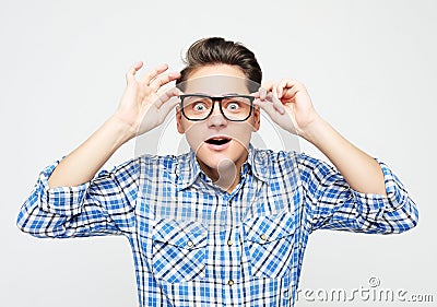 Lifestyle, happiness, emotional and people concept: photo of stupefied handsome male has shocked expression Stock Photo