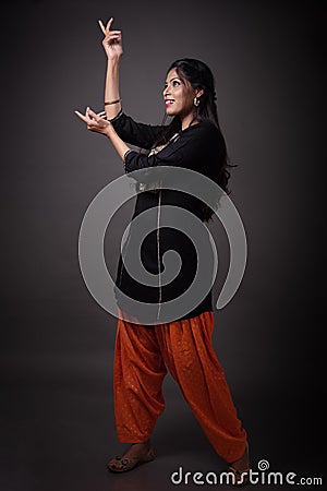 Lifestyle of Indian young girl in Punjabi attire Stock Photo