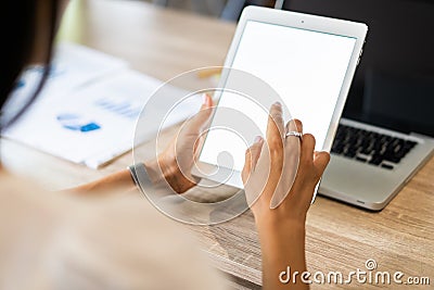 Lifestyle with modern woman using tablet or Ipad with hand holding touchscreen. Hands of working woman with Smart Tablet Stock Photo