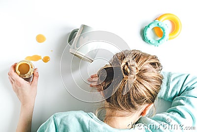 Lifestyle tired mother top view on white background Stock Photo