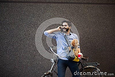 Lifestyle, transport, communication and people concept . Young man with bicycle and smartphone on city street Stock Photo