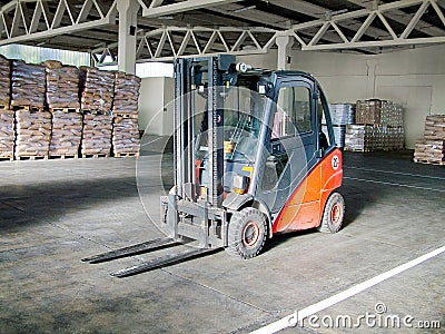Lifter in warehouse Stock Photo
