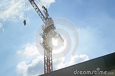 Lifting crane of reverse solar with blue sky Stock Photo