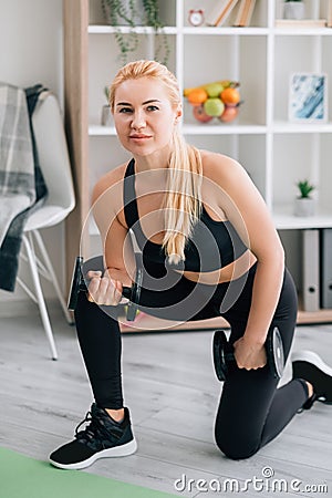 lifting workout sportive woman home fitness Stock Photo