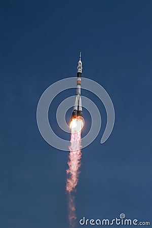 Liftoff to space - rocket speeding up and carrying astronauts to ISS Editorial Stock Photo