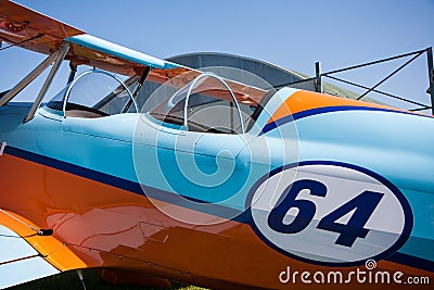 Light aircraft, modern biplane orange and blue Stock Photo