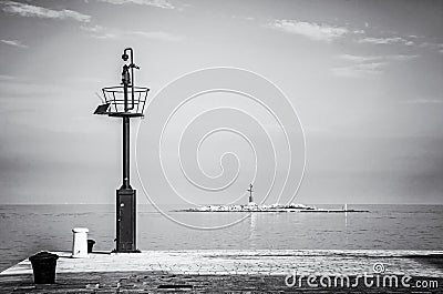 Light beacon on small island, Porec, Croatia Stock Photo