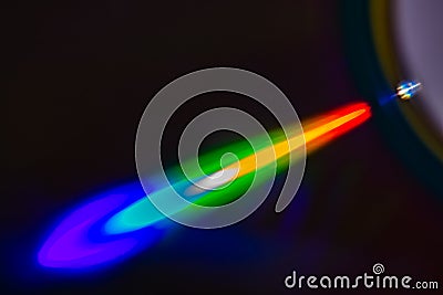 Multicolored Light Beam reflection on a polish surface . Stock Photo