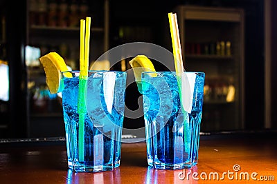 Light blue Cocktails stand on the table. Stock Photo