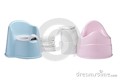 Light blue and pink baby potties, toilet paper and diapers isolated on white Stock Photo