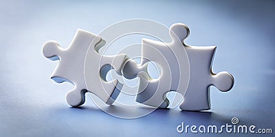 Light Blue Puzzle Pieces Interlocking A Visual Metaphor for Connection Unity and ProblemSolving Stock Photo