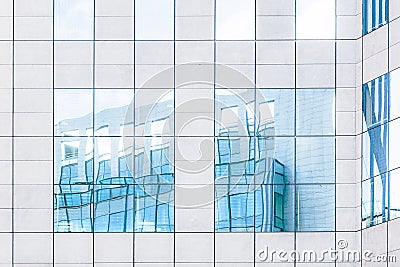 Light Blue reflections of buildings Stock Photo