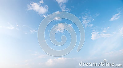 Light blue sky with tiny fluffy clouds Stock Photo