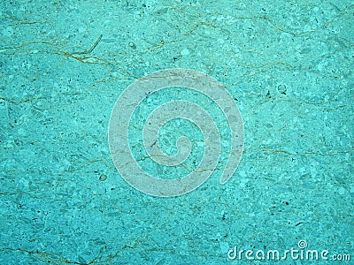 Light blue turquoise stone texture with a cracked irregular granular textured surface with an uneven distressed conglomeration sur Stock Photo