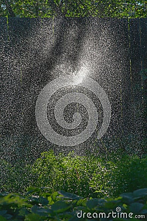 Light breaks through the splashes Stock Photo