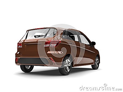 Light brown modern small compact car - back side view Stock Photo