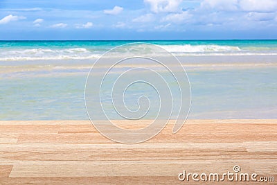 Light brown wooden table against amazing ocean view. Mockup image Stock Photo