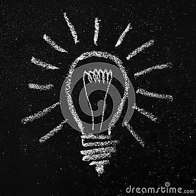 Light Bulb on Blackboard Stock Photo