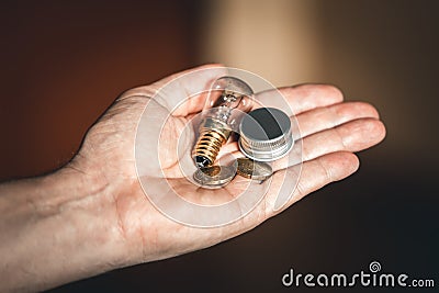 Light bulb, 40 cent and a lid, power concept price ceiling in germany Stock Photo