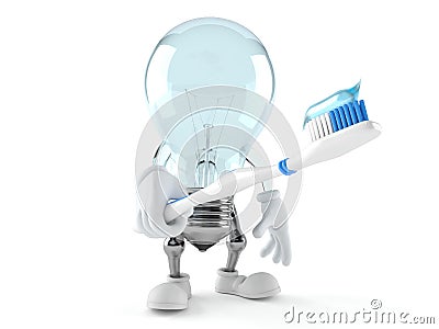 Light bulb character holding toothbrush Stock Photo