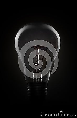 Light bulb in dark Stock Photo