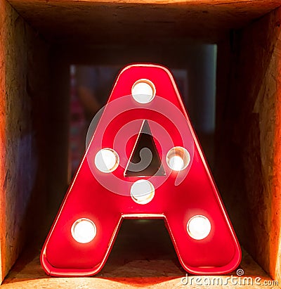 Light bulb glowing letter alphabet character A font Stock Photo