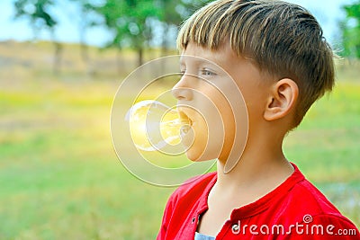 A light bulb glows in a person, a child holds a lighting device with his mouth Stock Photo