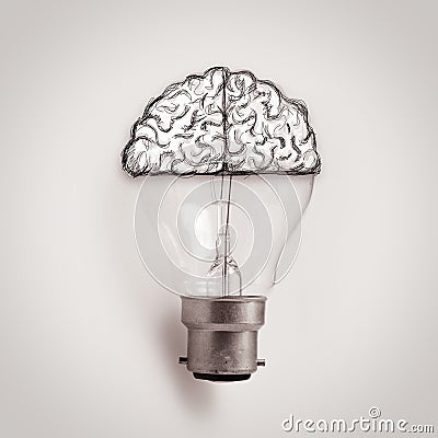 Light bulb with hand drawn brain as creative idea Stock Photo