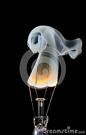 Light bulb and smoke Stock Photo