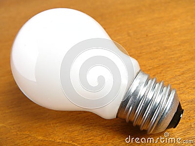 Light bulb on wood Stock Photo