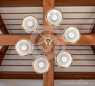 a light chandelier ceiling under roof Stock Photo