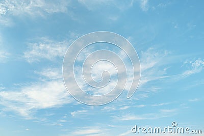Light cirrus clouds on light blue sky Stock Photo