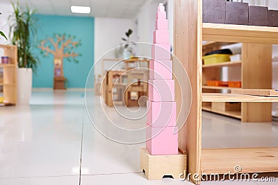 Light class in Montessori kindergarten. The pink tower is in the foreground. nobody Stock Photo