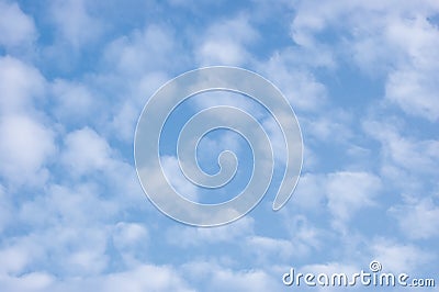 Bright sunny summer sky cloudscape, large detailed blue skies, light clouds background, horizontal copy space Stock Photo
