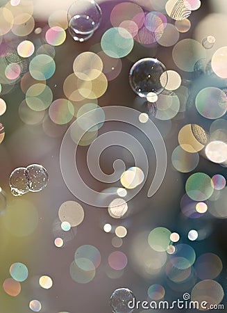 Light colored soap bubbles Bokeh Background Stock Photo