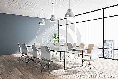 Light concrete and wooden meeting room office interior with panoramic windows, city view, lamps and furniture. Stock Photo