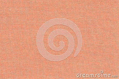 Light coral background from a textile material with wicker pattern, closeup. Stock Photo