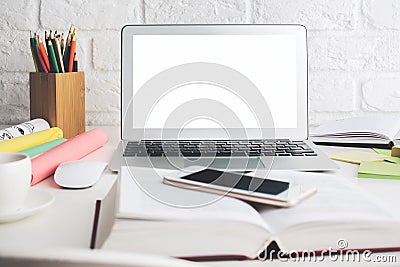 Light desktop with white laptop screen Stock Photo