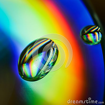 Light diffraction showing rainbows on water drops Stock Photo