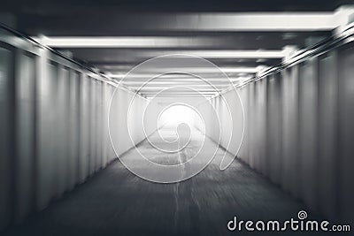 The Light at the End of the Tunnel. Pedestrian crossing under the road. underground passage. motion blur. concept of Stock Photo