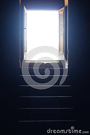 The light entering the open door in the church Stock Photo