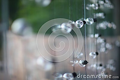 Light garland with small transparent round lamps Stock Photo