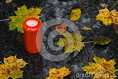 Light grave on All Saints Day Stock Photo